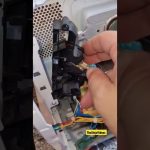 Microondas con botón de inicio roto